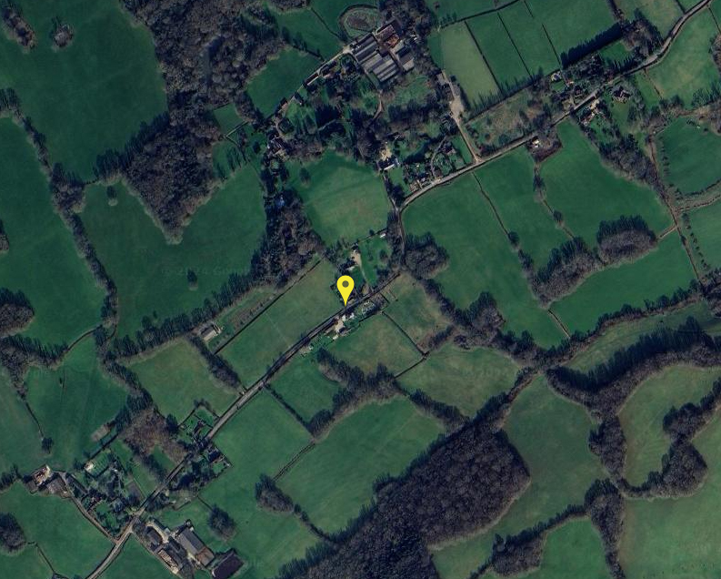 Aerial view of rural business site in AONB